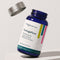 Blue supplement bottle labeled 'regenerative LongeFera' on a light gray background